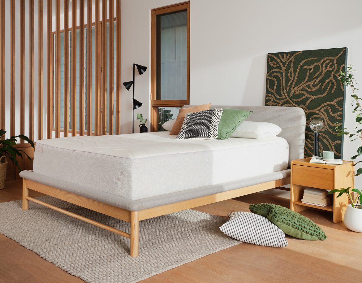 What are the benefits of using a bed frame with storage drawers?